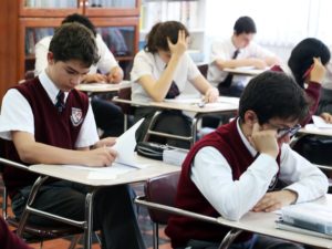 Students writing in class